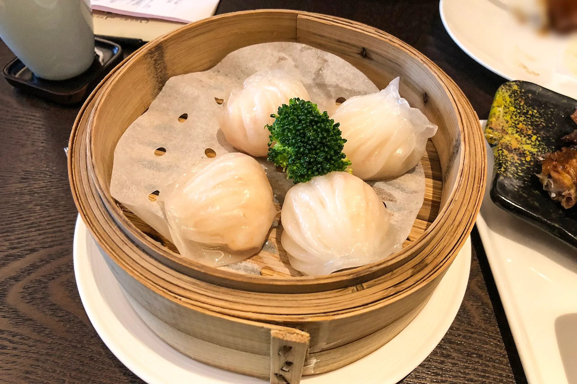 Har gow in a bamboo steamer