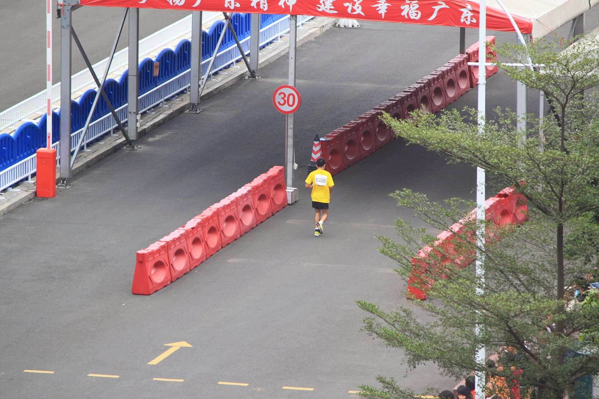 A runner on the course of the Guangzhou Marathon