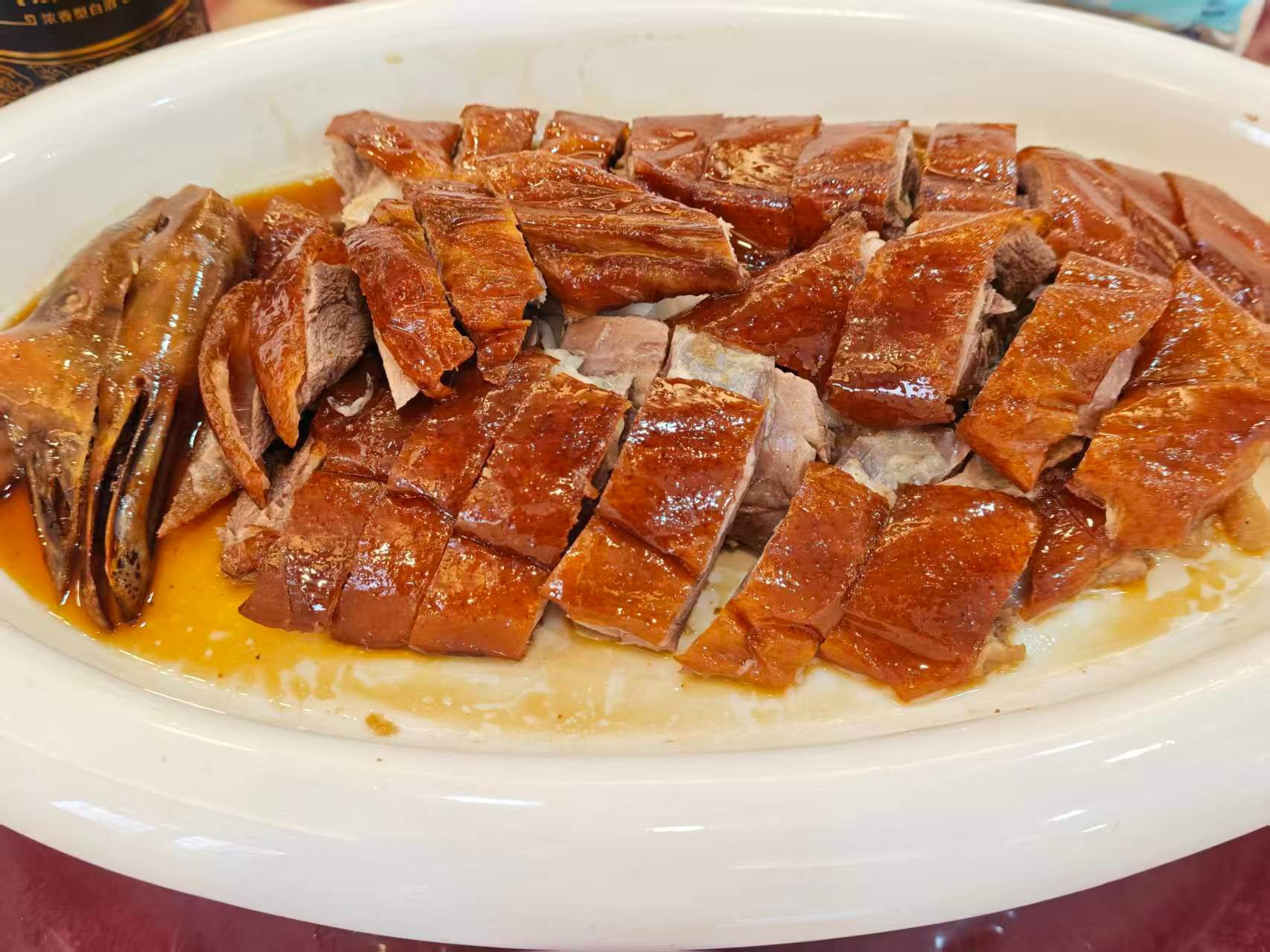 Sliced Cantonese roast goose on a plate